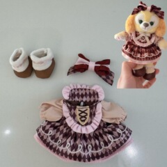黒チョコレートケーキのストラップの子供服15cmの立っている姿の裸の犬の着せ替えの小さいスカートのぬいぐるみは小さい服のためにストラップしています。