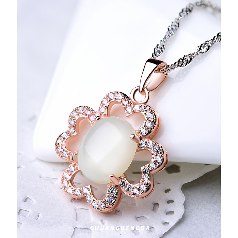 S925 plata y diamante de oro collar colgante de cuatro hojas colgante mujer al por mayor japonés y coreano pequeña cadena clavícula de temperamento fresco