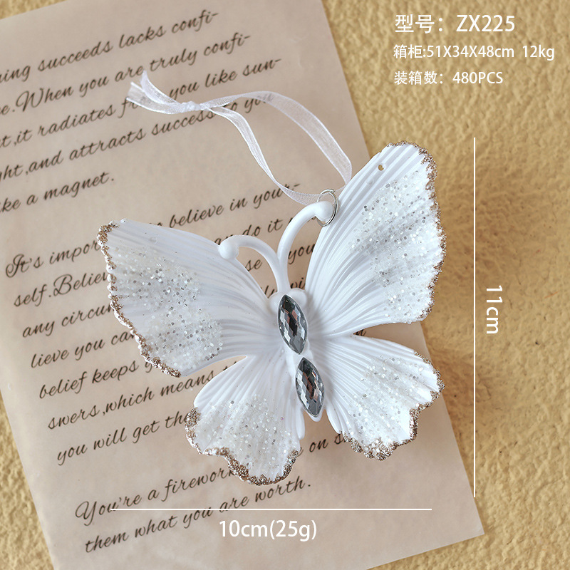 Nuevo colgante de acrílico de Navidad blanco transfronterizo, copos de nieve en polvo de brillo, paquete de regalo de árbol de Navidad de mariposa, colgante de caramelo pequeño