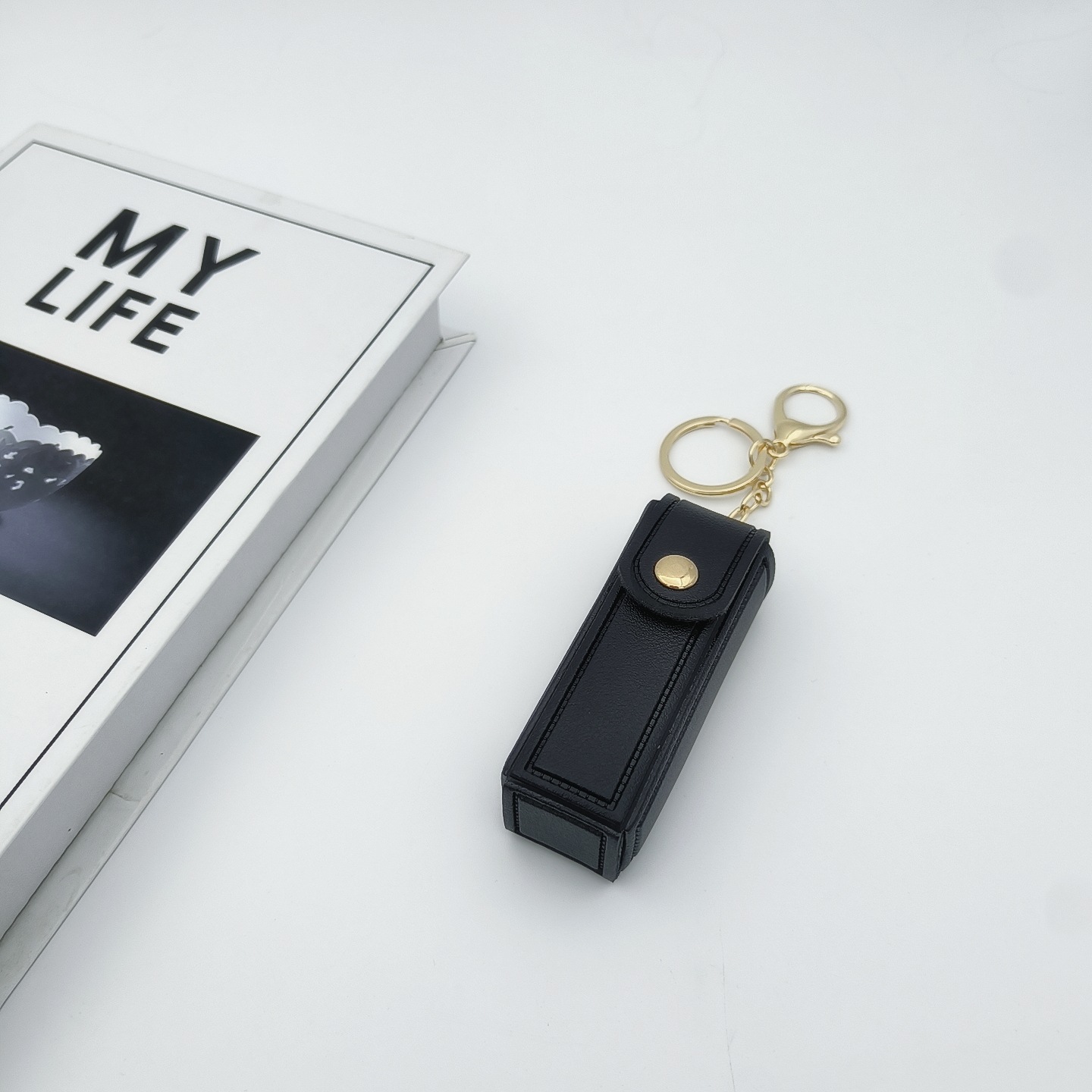 Bolso de cambio transfronterizo sobre rojo espejo creativo llavero colgante pequeño PU cuero bolso de coche accesorios accesorios en stock