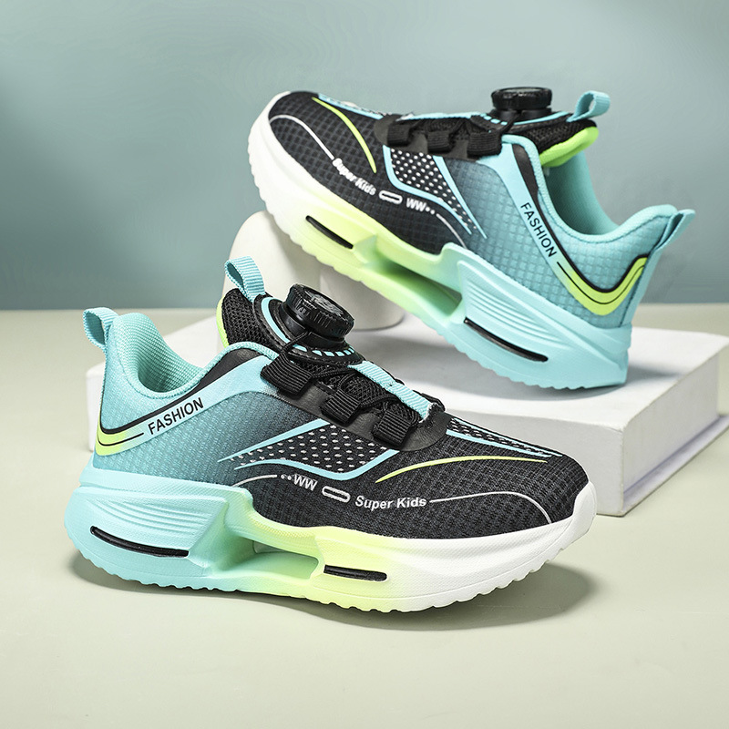 Fábrica directa de botón giratorio para niños zapatos de carrera primavera y otoño antideslizante para niños y niñas zapatos deportivos transpirables ligeros al aire libre cómodos