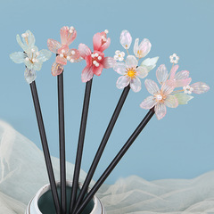 Wooden hairpins with coiled designs, vintage-style hairpins and hairsticks—perfect for Hanfu headwear, retro flower-inspired accessories, tea-ceremony outfits, and Qipao hairstyles, ideal for women.