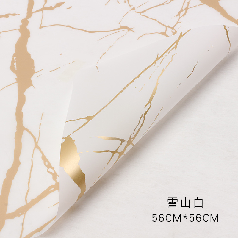 Patrón de mármol dorado Papel de embalaje de flores impermeable engrosado Papel mate Papel de embalaje de ramo Papel de embalaje Hansu al por mayor