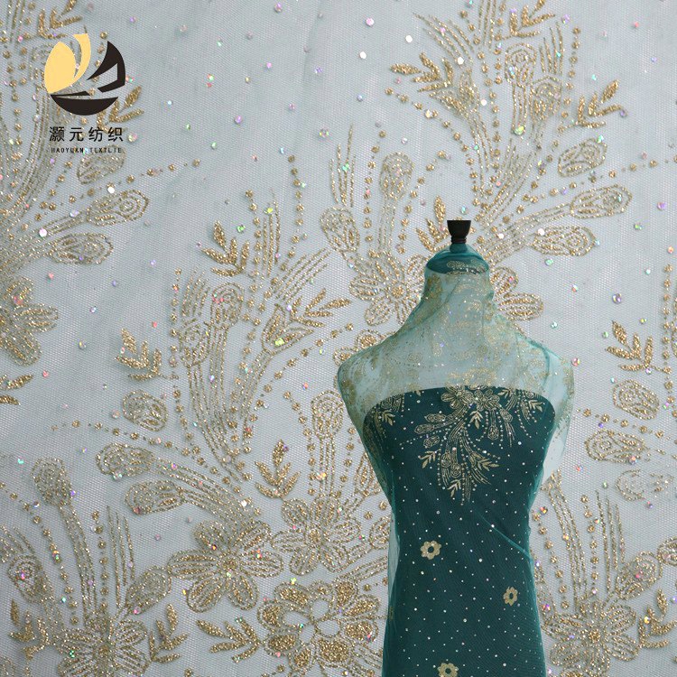 Nuevo posicionamiento flor doble polvo láser sequinilla pulverizado oro malla tela de rendimiento de ropa infantil estilo chino tela de ropa