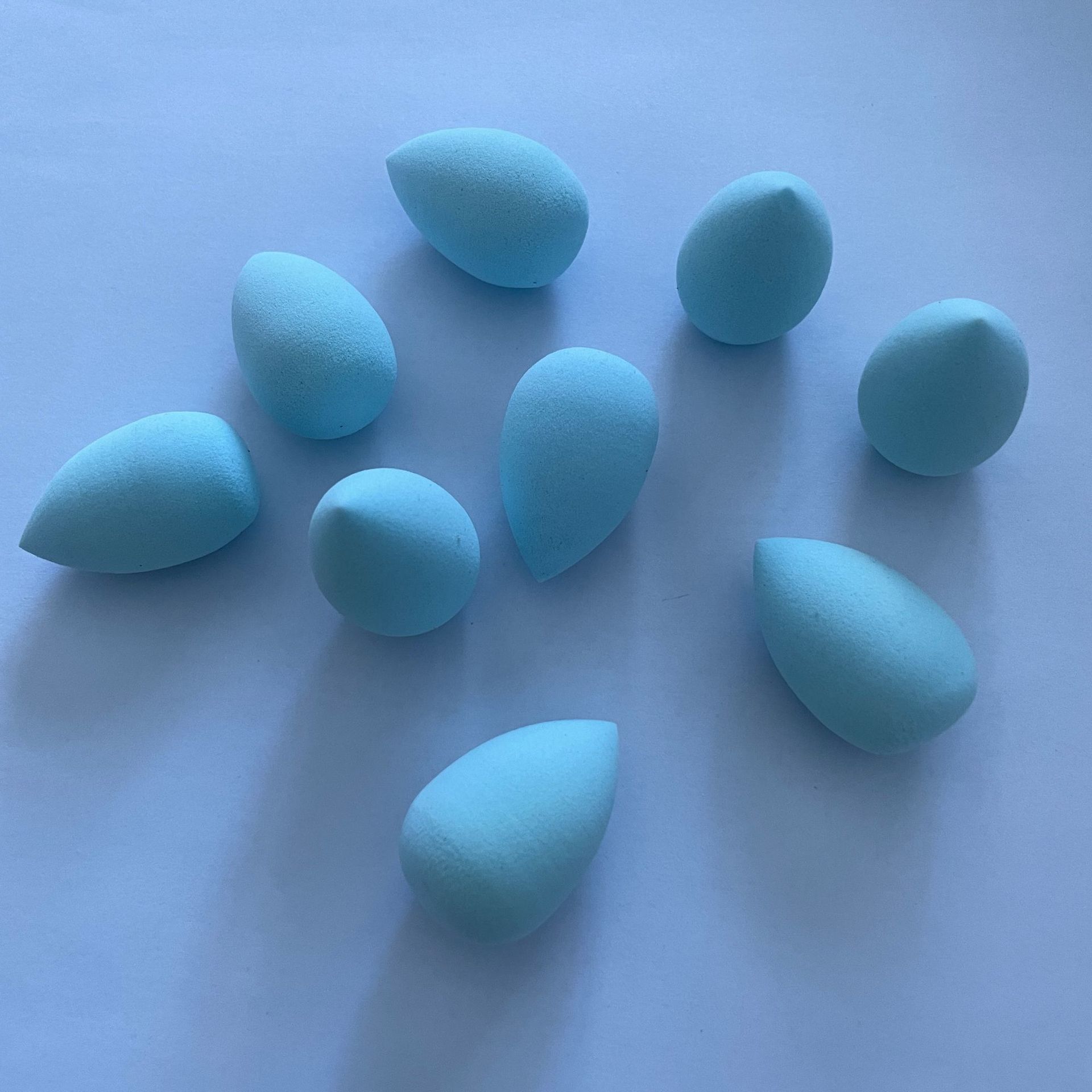 Mini esponja de belleza, pequeña esponja en forma de huevo, esponja en forma de gota de agua, mini esponja para polvo, pequeña esponja para base y corrector de comercio exterior.