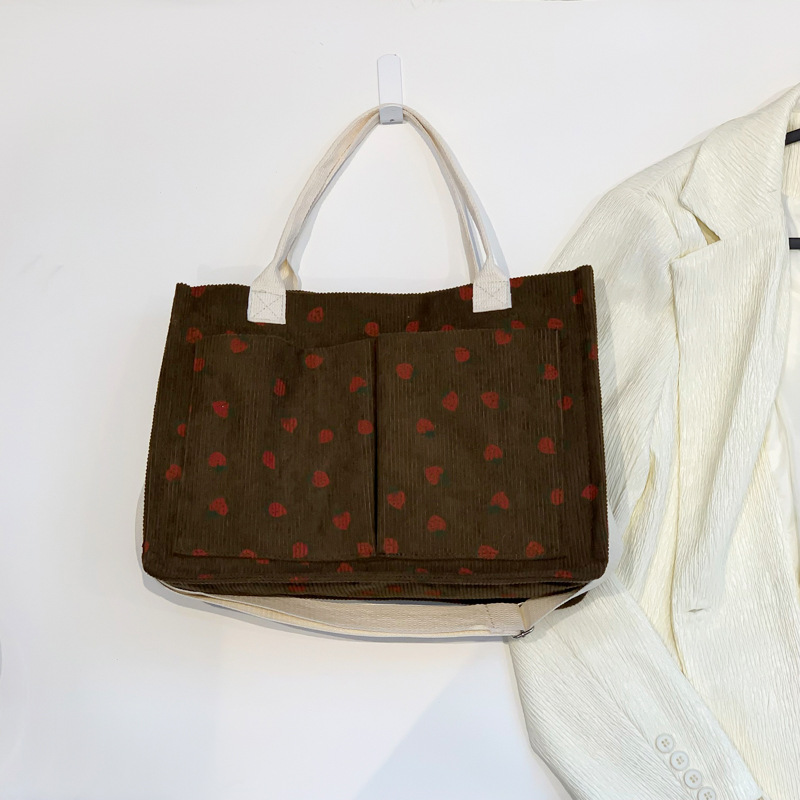 Bolsas de impresión de fresas populares de vello coreana para mujeres verano 2024 nuevo tipo transfronterizo mochila de hombro mochila