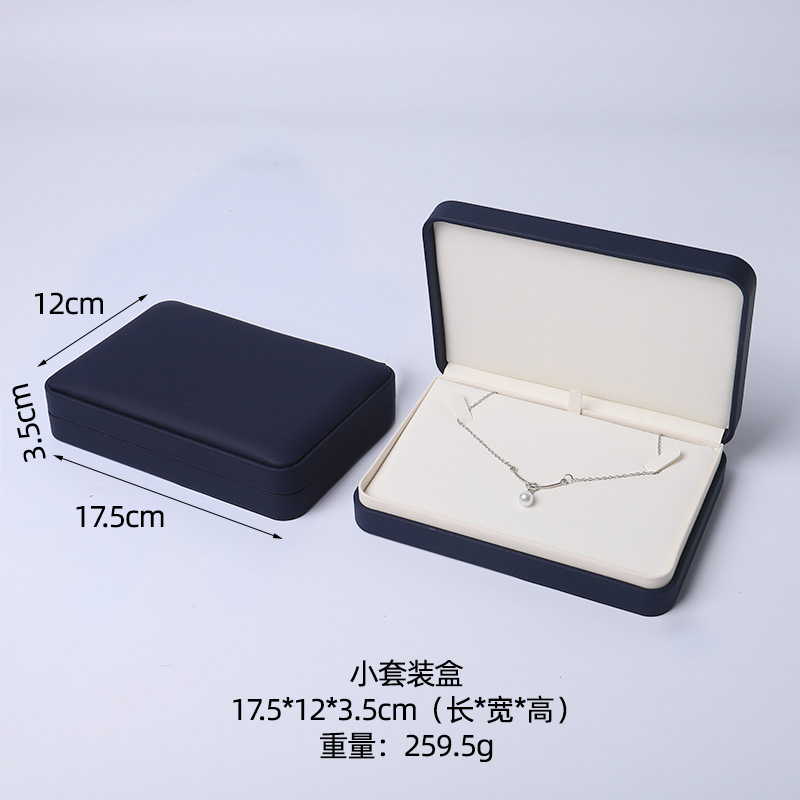 Caja de joyería rosa de alta calidad de cuero pu caja de embalaje de marca de joyería logotipo colgante pulsera collar caja de anillo