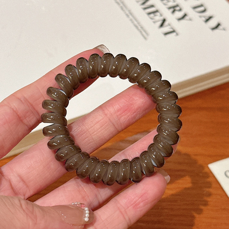 キャンディー色の電話線の髪輪の女性は高弾力で長持ちします。|undefined