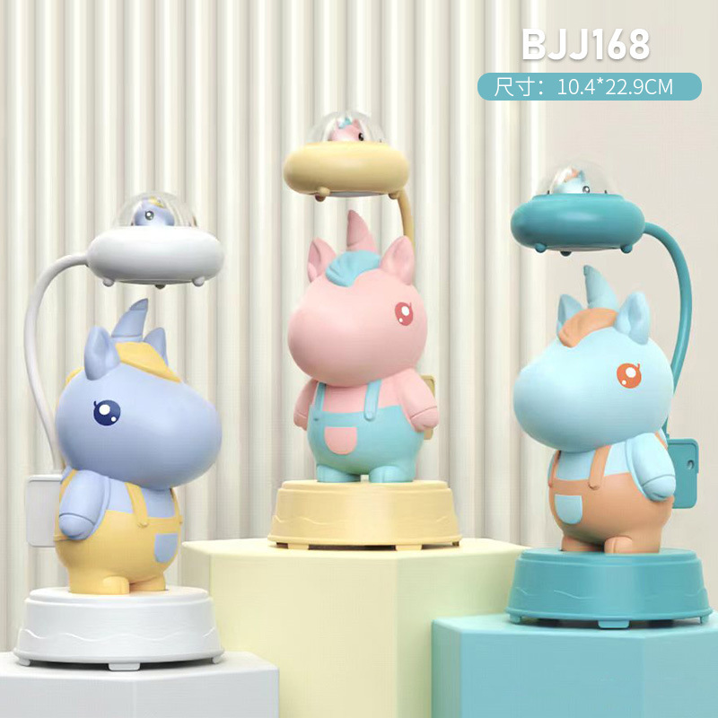 Dibujos animados astronauta Rana dinosaurio unicornio sacapuntas lámpara de mesa USB recargable habitación de los niños LED protección de los ojos lámpara de mesa