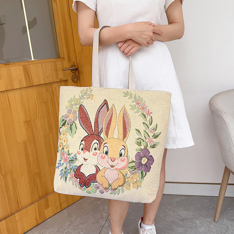 도매 새로운 양면 골드 자카드 자수 토끼 코끼리 공작 어깨 가방 민족 스타일 휴대용 통근 가방