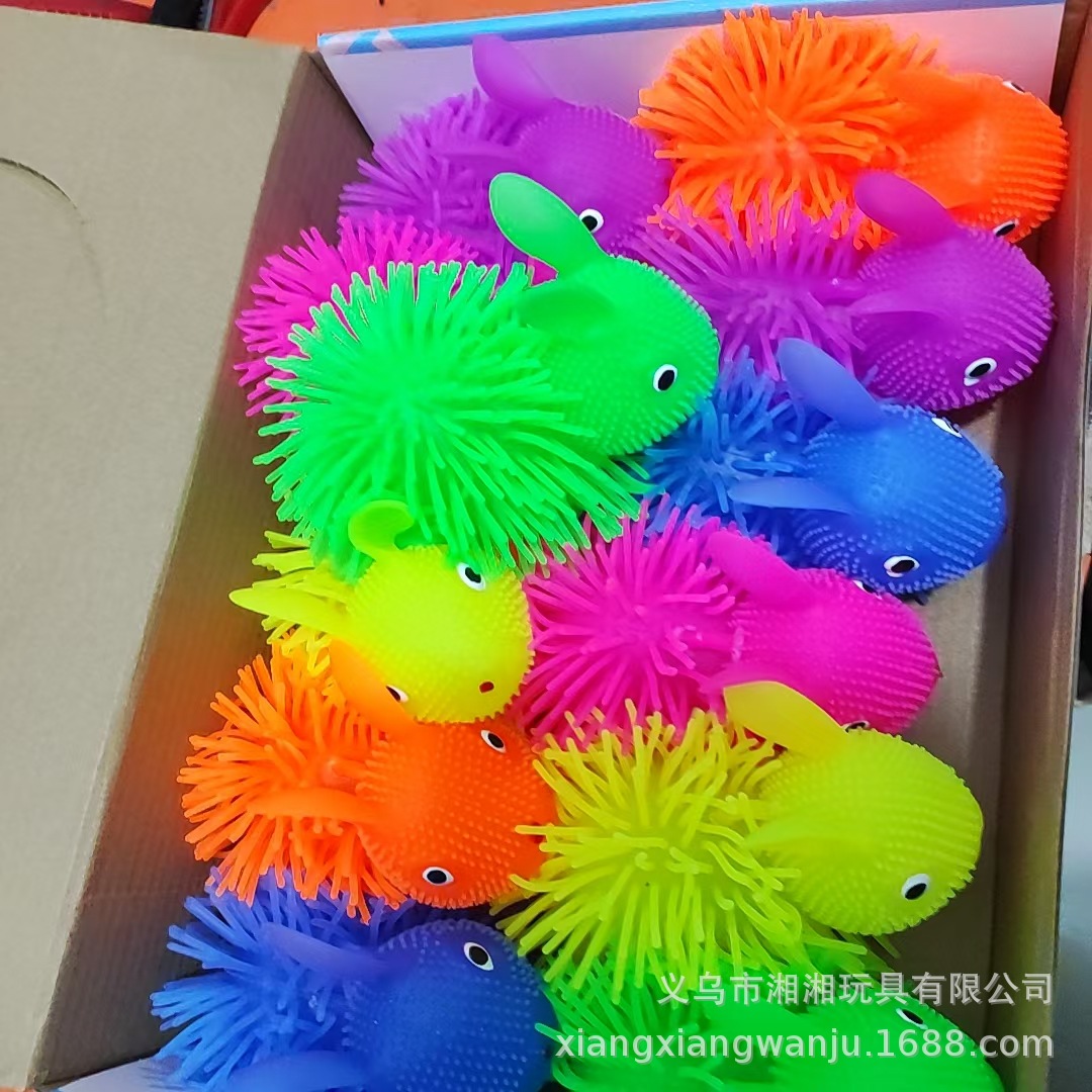 Conejo parpadeante bola de pelo TPR lindos perros peludos brillantes bola de pelo juguetes de ventilación juguetes calientes