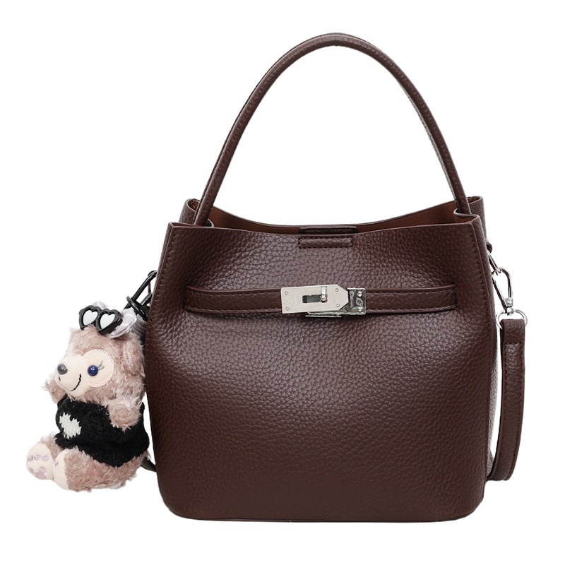 Bolso de mano de alta sensación para mujeres 2025, nueva moda versátil bolso de mochila de gran capacidad de viaje a casa bolso de cubo