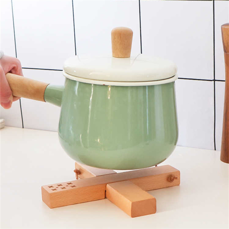 De estilo japonés de madera maciza mesa de comedor estera de aislamiento creativo de haya Cruz estera plegable X-tipo anti-scald herramientas casa buenas cosas