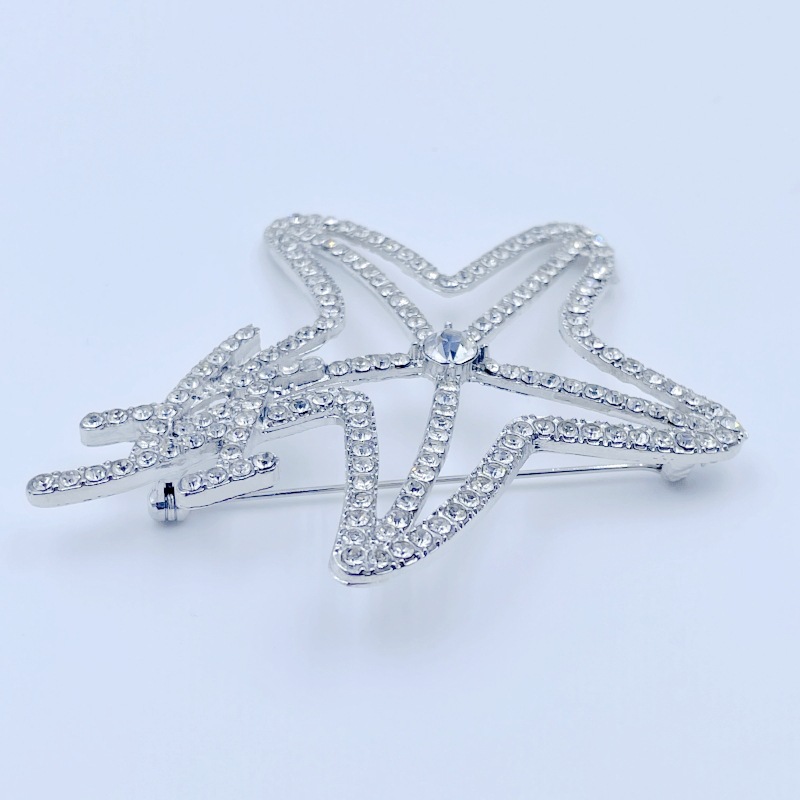 Venta caliente europea y coreana pin luz lujo moda viajero versátil estrella de cinco puntas broche Inglés estilo Chanel ramillete personalizado Accesorios