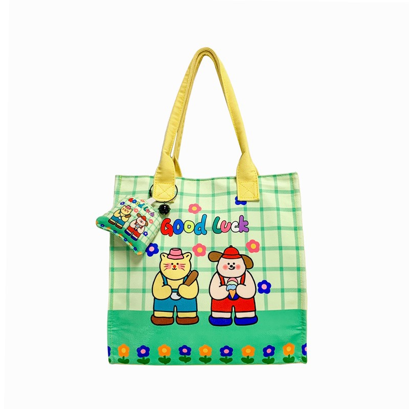 Caricatura de niños y niñas, bolsos de hombro de gran capacidad, bolsos de nicho de diseño, bolsos de mano nuevos lindos para niñas