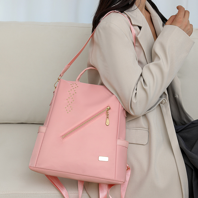 Nuevo estilo remache damas mochila antirrobo moda ligero ocio viajes al aire libre mochila de nailon mochila escolar para estudiantes