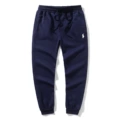 Navy blue pants white label