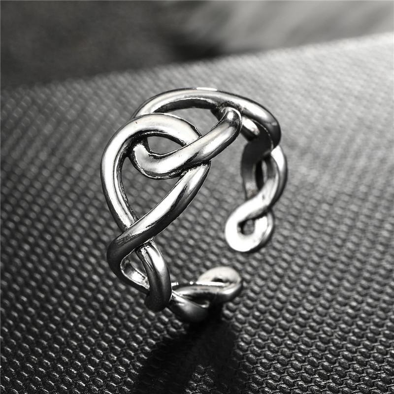 Fashion Geometric Bow Smooth Hollow Metal Ring display picture 9