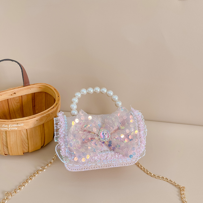 Primavera y verano nueva celebridad en línea bolso de los niños moda Chanel estilo princesa bolsa pequeña niña linda bolsa de mensajero portátil al por mayor