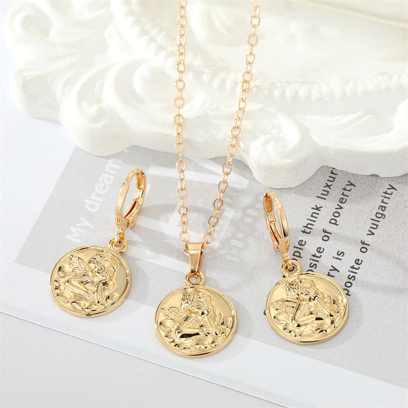 Fashion Golden Round Coin Embossed Angel Earring Necklace Set display picture 5