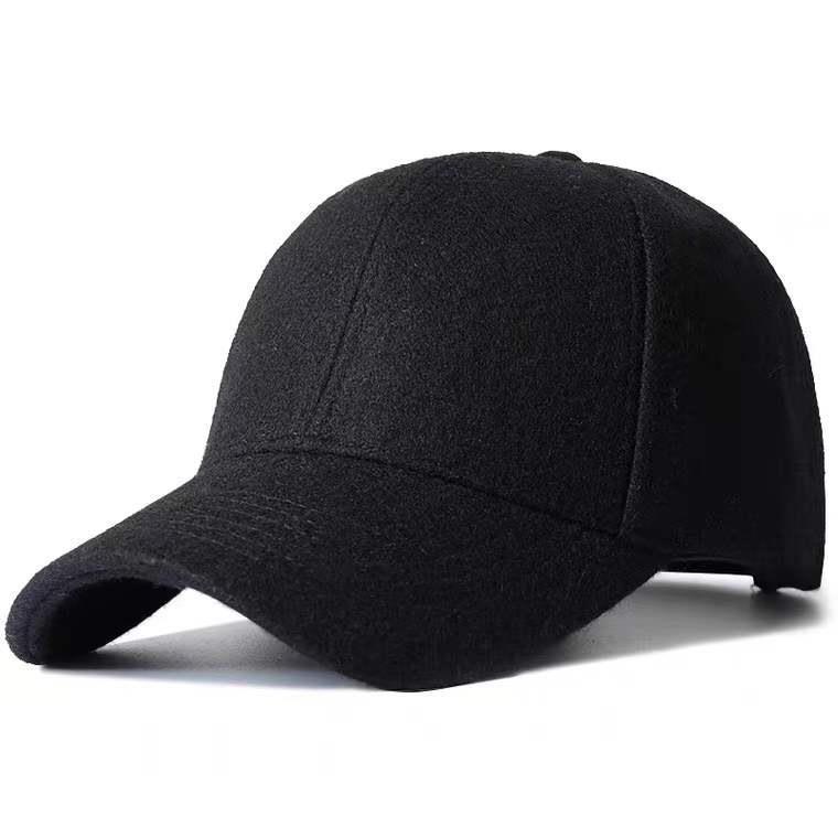 Hombres y mujeres de invierno nuevo estilo coreano de lana negra caliente estilo casual gorra de lengua gorra de béisbol gruesa