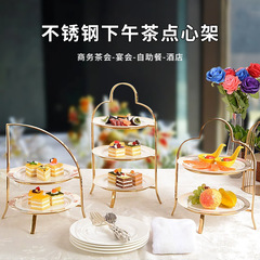 三階の午後のお茶のお菓子の棚の冷たい食事会のケーキのデザートの台の展示棚の置物の果物のトレーのお茶の休憩台