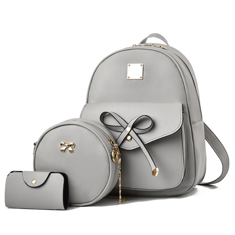 Mochila transfronteriza [Mochila] Superventas 2025 Nueva moda Mochila de tres piezas Gran capacidad Estilo coreano Lazo Bolso de mujer