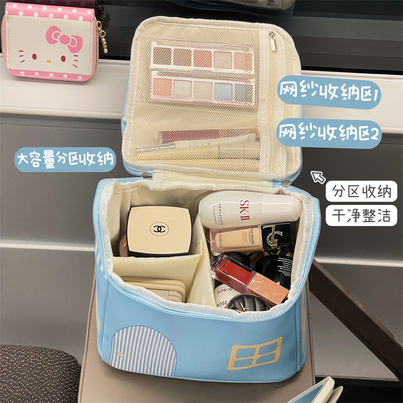 Bolsa de cosméticos para casa pequeña bolsa de almacenamiento portátil de gran capacidad para mujer bolsa de almacenamiento de viaje bolsa de lavado de nicho linda resistente a la suciedad