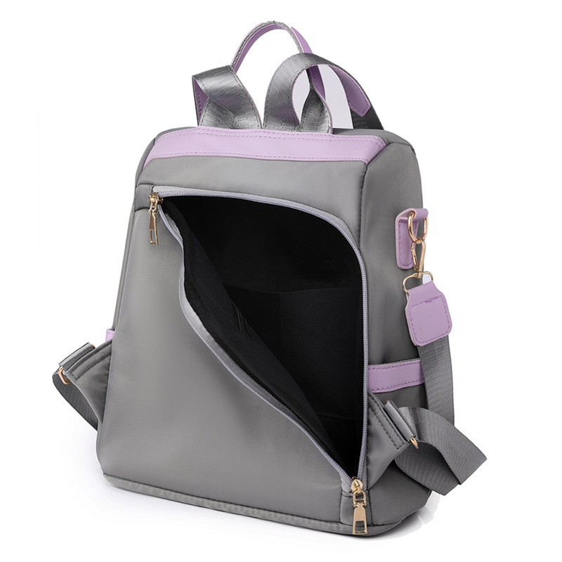 Mochila de nailon antirrobo para mujer 2023 nuevo estilo casual color de contraste mochila multifuncional de gran capacidad mochila escolar al por mayor