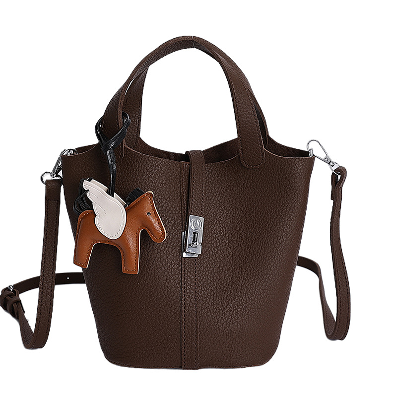 Bolsa de cestas de comida de mano de alta calidad 2025 nuevo invierno simple bolso de cubo casual bolso de hombro de mujer coreana