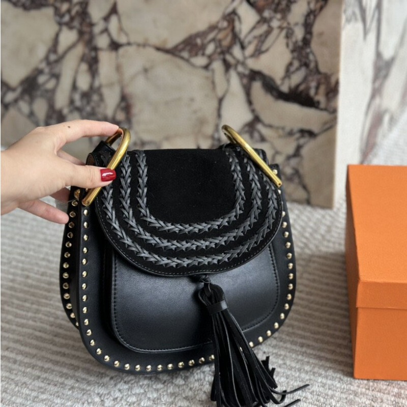 24 New Autumn and Winter Tassel Saddle Bag Retro Woven Shoulder Bag Rivet Western Woven Women's Bag 24 New Autumn and Winter Tassel Saddle Bag Retro Woven Shoulder Bag Rivet Western Woven Women's Bag