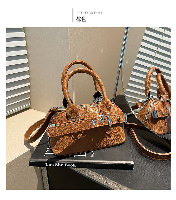 A simple and individual hand-held shell bag, a new Spring/Summer 2025 niche fashion casual shoulder bag, a trendy and stylish crossbody bag undefined