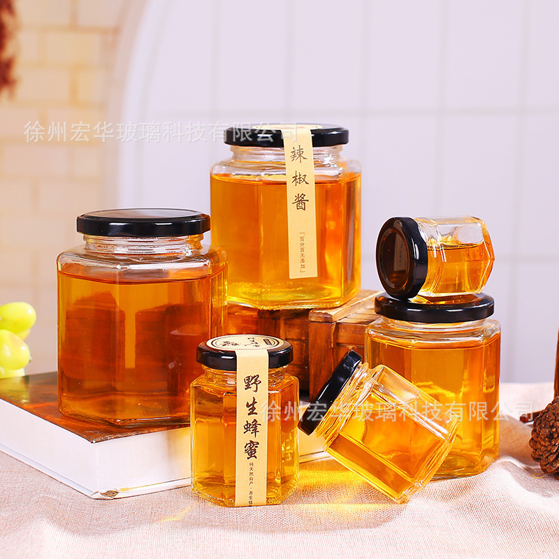 厂家直供透明多规格密封玻璃蜂蜜罐六棱玻璃蜂蜜包装瓶酱菜果酱罐