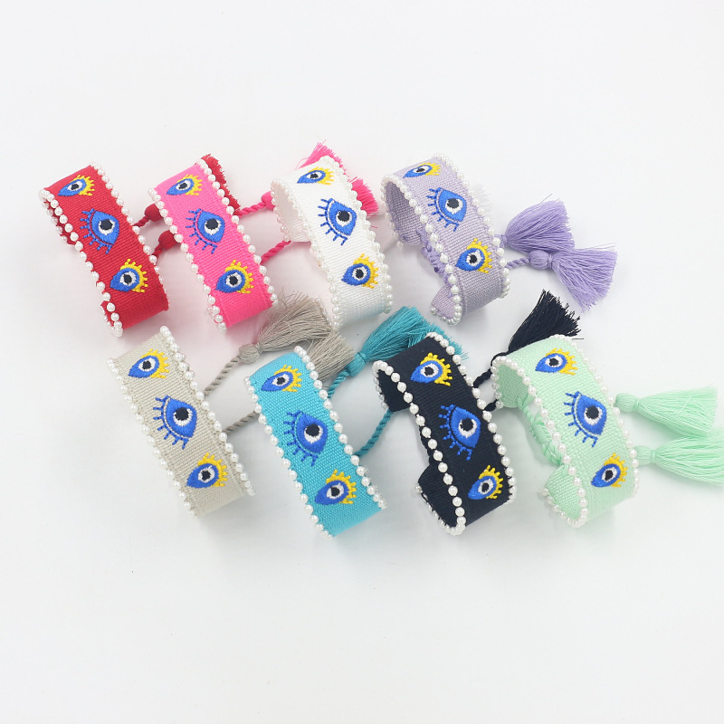 Cross-Border Hot Selling Webbing Embroidered Devil's Eye Pearl Bracelet for Women Simple Adjustable Handmade Tassel Braided Bracelet