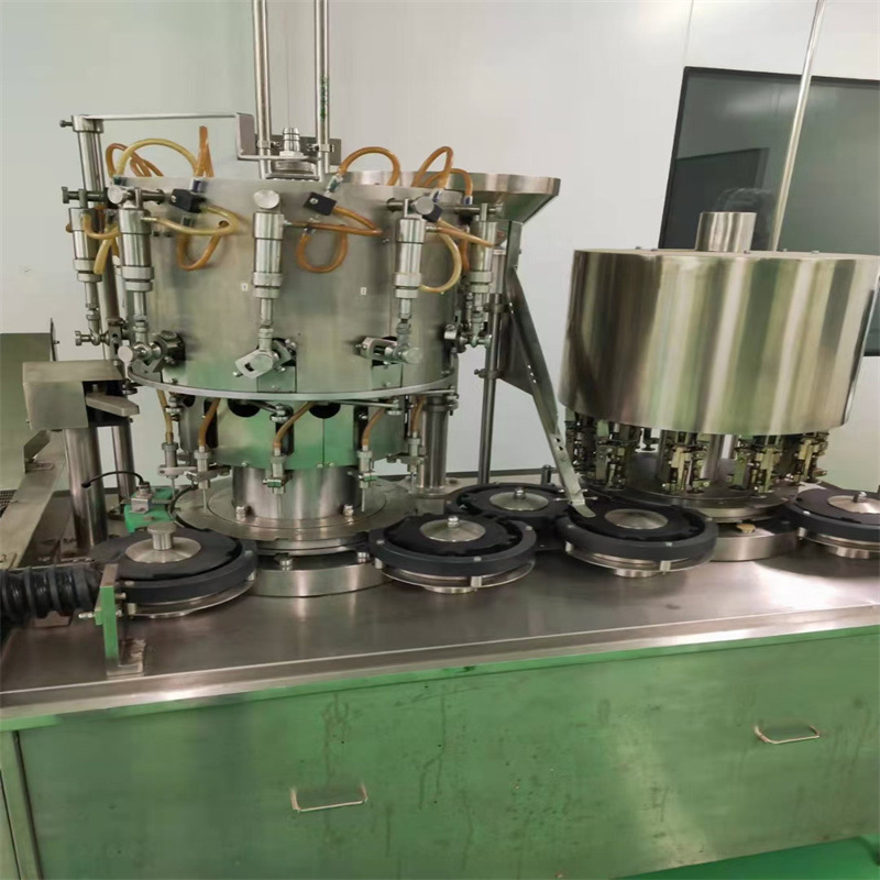 出售二手二手三合一玻璃瓶液体灌装机封罐机 果汁灌装机封罐机