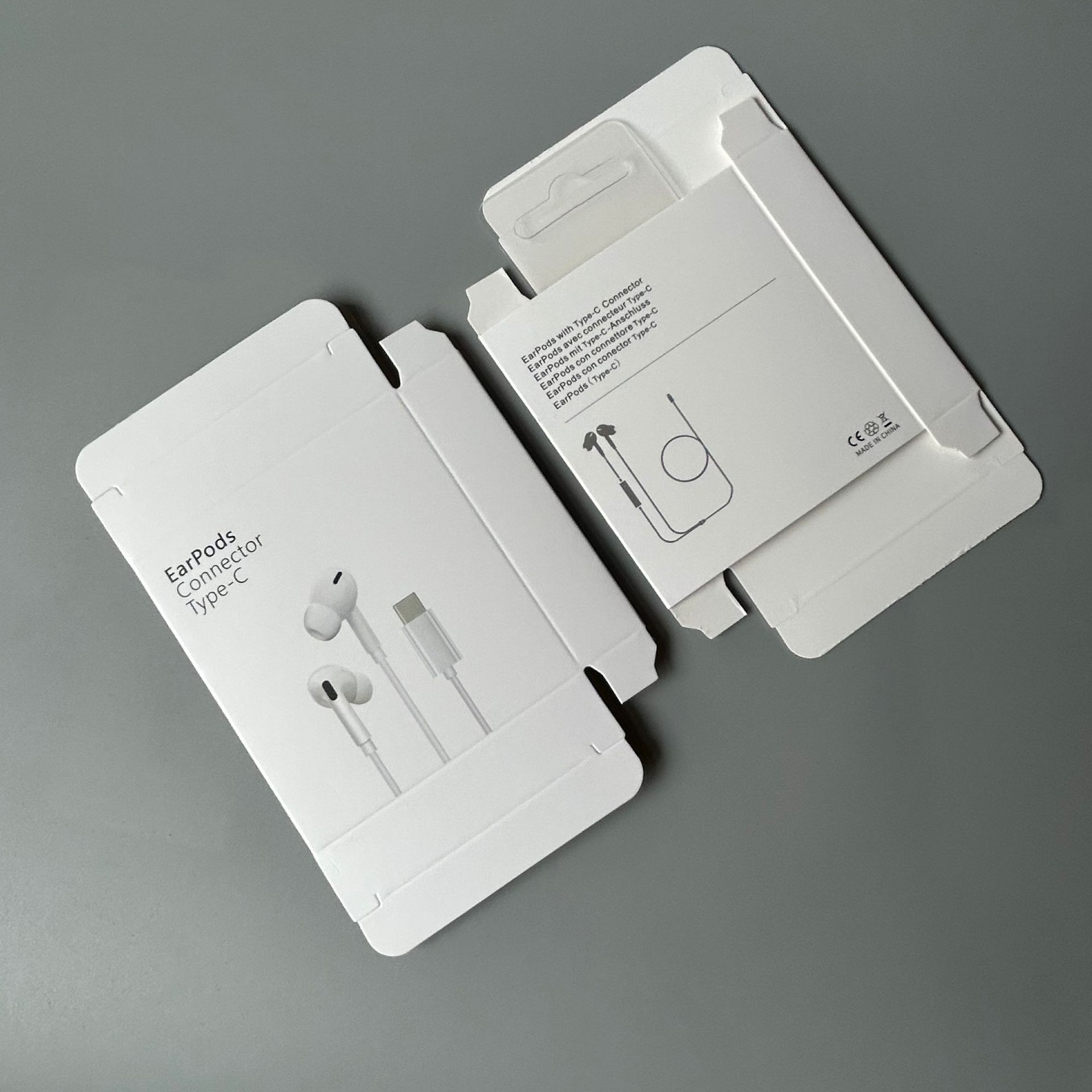 Caja de embalaje de auriculares Caja de auriculares con cable en la oreja Caja exterior de auriculares de Apple Caja de papel de auriculares para teléfono móvil al por mayor image 19