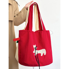 韓国刺繍ナイロンショルダーバッグ 2025 新しいニッチ大容量子犬刺繍トートバッグ通勤キャンバスバッグ