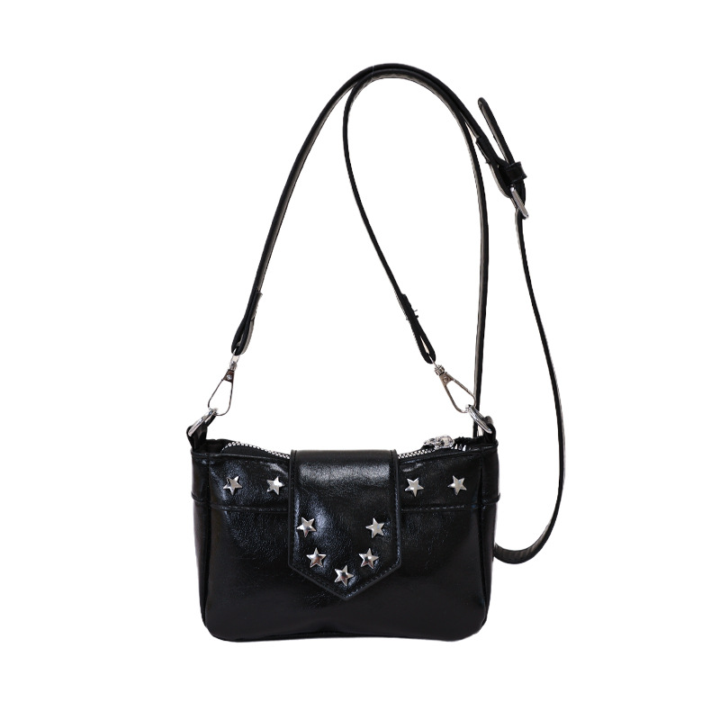 Simple retro bolso axilar 2026 nuevo bolso de remaches personales coreano en el temperamento bolso de hombro de viaje