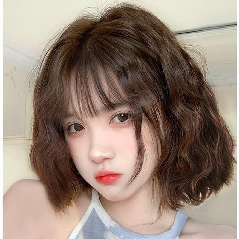 Peluca directa de fábrica Rollo de lana de pelo largo de longitud media de las mujeres Mano rápida Internet Celebrity Air Bangs Hombro Rollo de huevo Cabeza Peluca Cubierta de cabeza