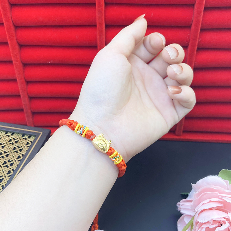 Nueva cuerda roja al vapor albóndigas Longyue Nansha pulsera de oro Ruyi nudo todo partido joyería de estilo chino popular en línea sala de estar