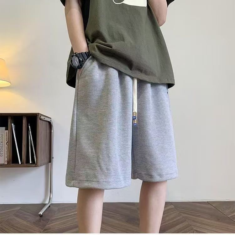 Diseño delgado nicho relajado de verano nuevo estilo americano pantalones cortos de moda hombre pantalones deportivos casuales de cinco puntos