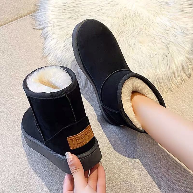 Botas de nieve del noreste de las mujeres en invierno de 2025 nuevos zapatos casuales de algodón de mujer con zapatos de nieve de terciopelo calientes