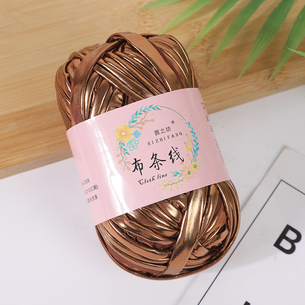 Línea textil Qian Zhi hilo de color mágico tejido a mano hilo de fantasía de color bricolaje en stock fábrica al por mayor