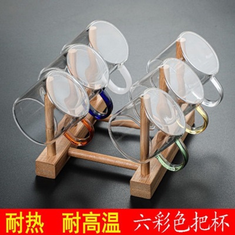 Venta al por mayor de vidrio borosilicato pequeña taza de té mango de color taza de vidrio con mango taza de té de Kung Fu transparente