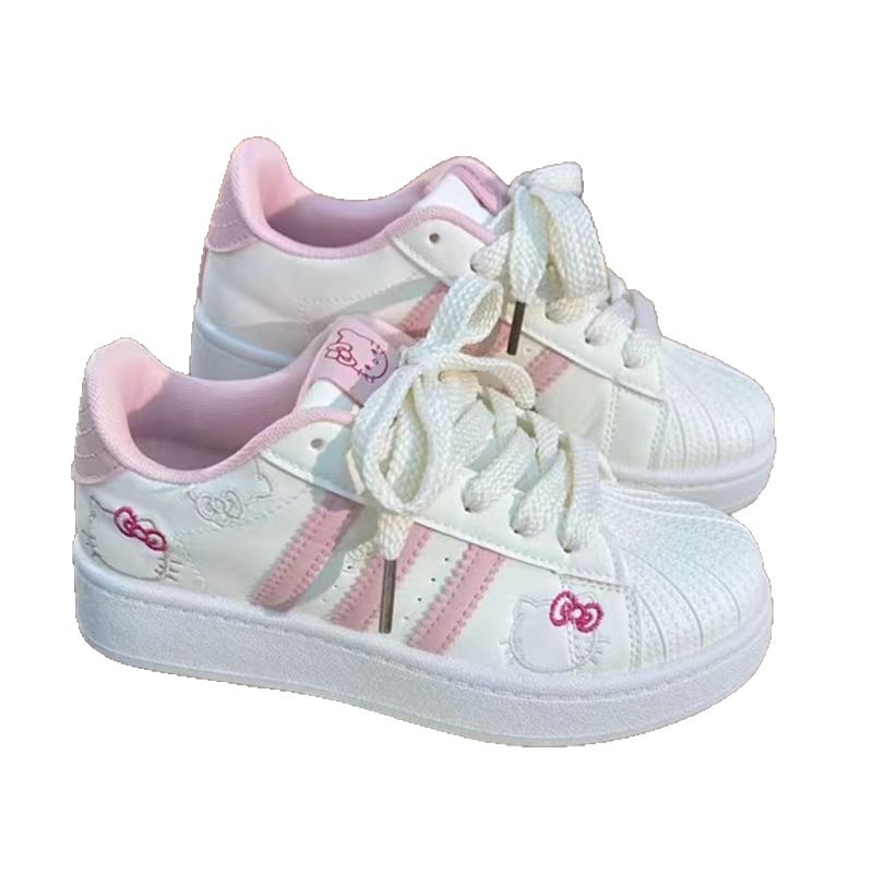 2026 primavera nuevo polvo blanco gato zapatos de pan de cabeza de concha de mujer estilo de escuela zapatos de skate de nicho zapatos deportivos bajos
