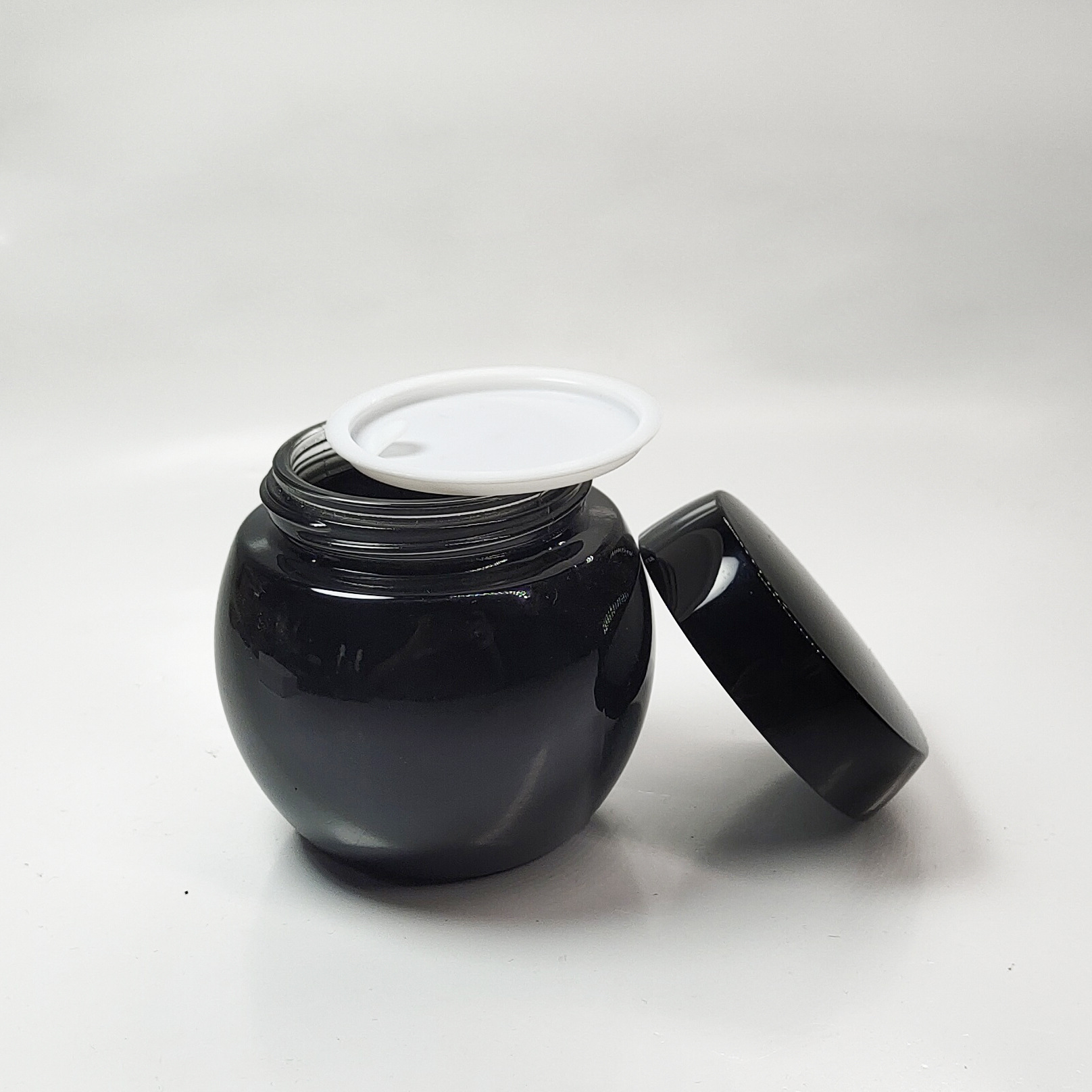 Fábrica en stock al por mayor 614 botella de máscara de vidrio al por mayor con forro 50g sin forro 120g sub-botella de vidrio