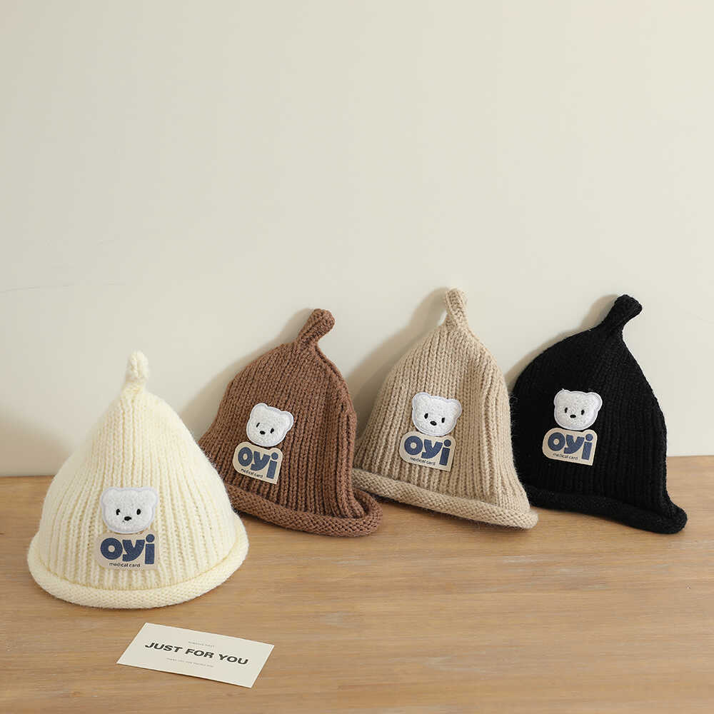 2024 otoño y invierno nuevo unisex lindo sombrero de punto de cabeza de oso simple sombrero de lana casual universal