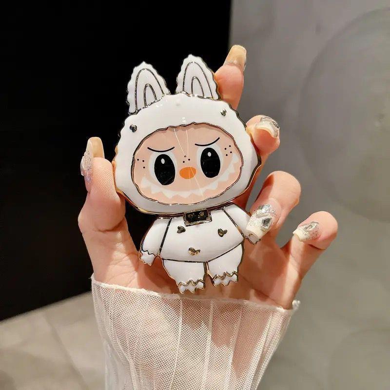 漫画かわいいラブブ携帯電話ホルダーラブブ化粧鏡ホルダーミラー携帯電話ホルダーは回転して折りたたむことができます|undefined