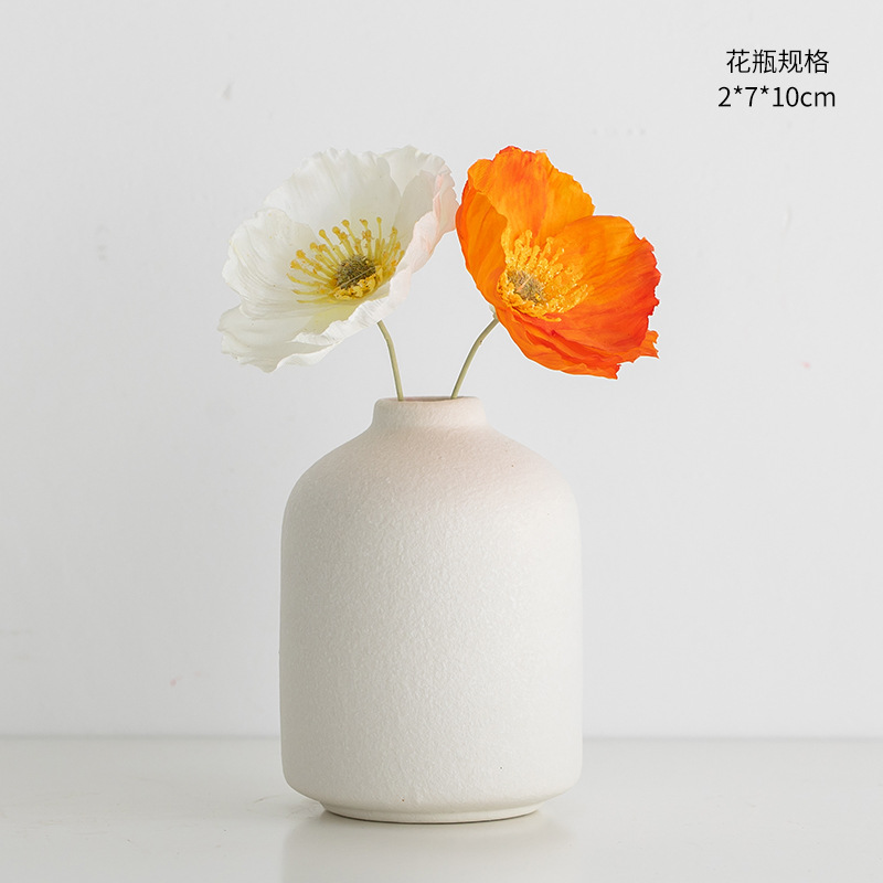 흰색 오렌지 양귀비 꽃 병