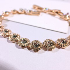 クロスボーダー施家高バージョンファッションシンプルな円形シングルドリルボタンブレスレット
